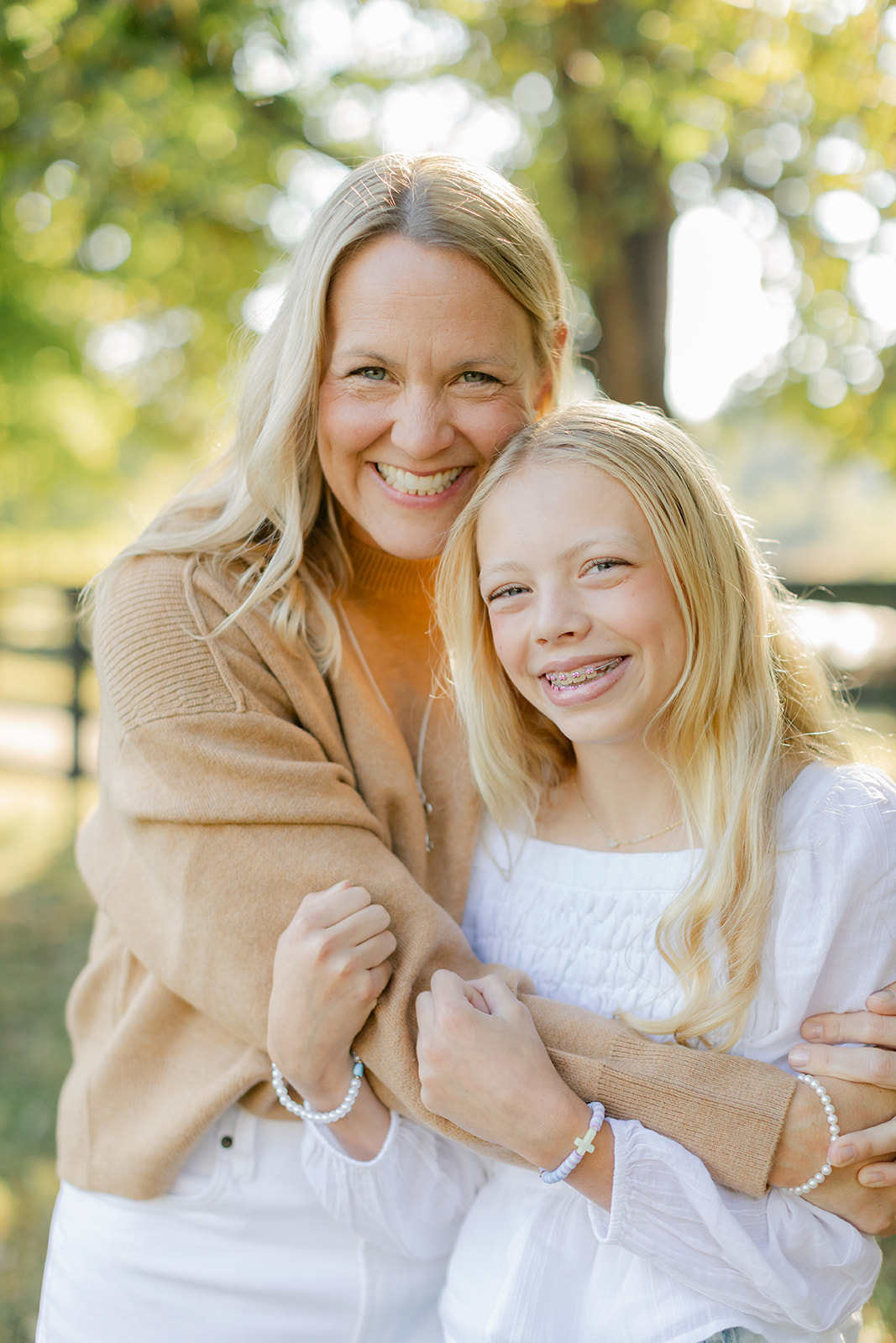 mom and tween (teenager) daughter during outdoor family photos