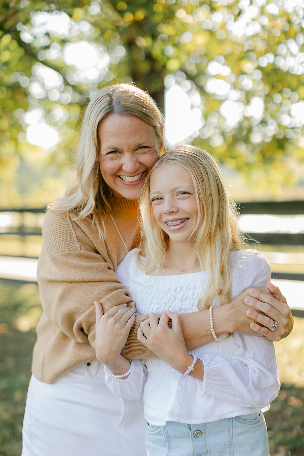 mom and tween (teenager) daughter during outdoor family photos
