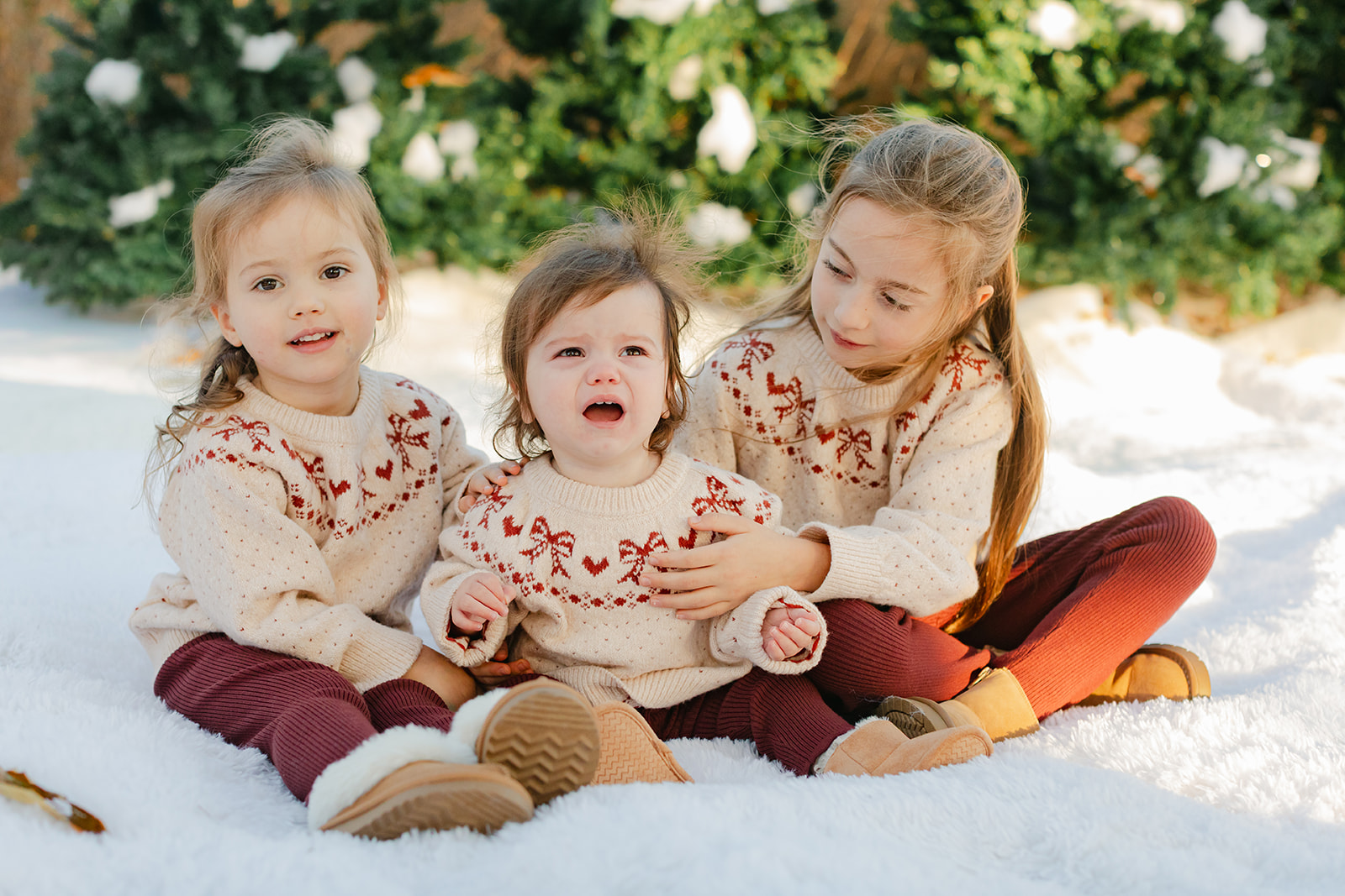 three little girls. outdoor christmas family photo.