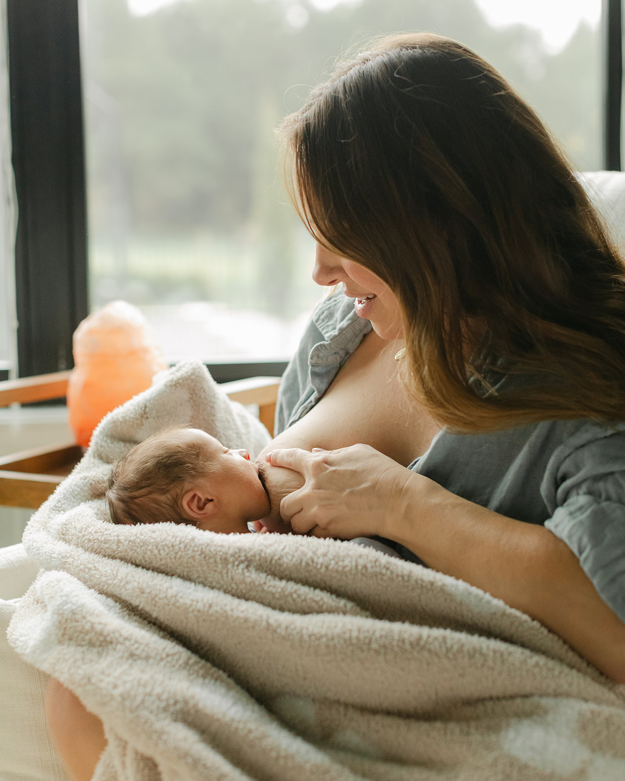 mama breastfeeding baby
