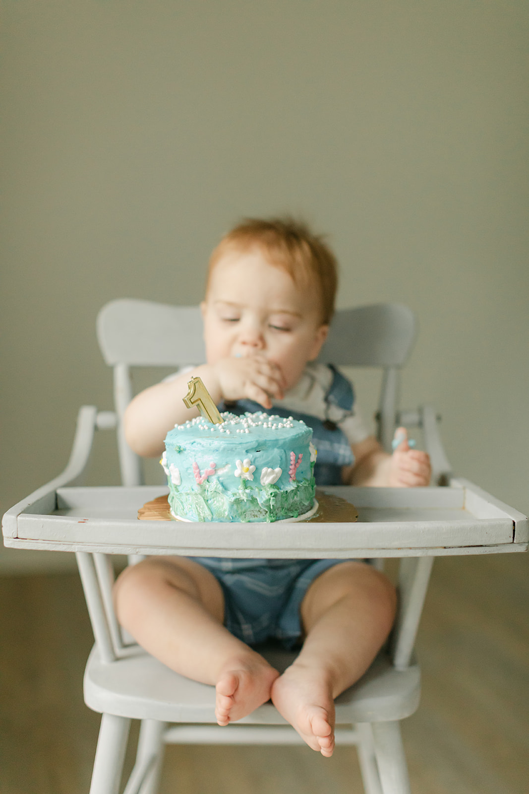 baby boy eating cake