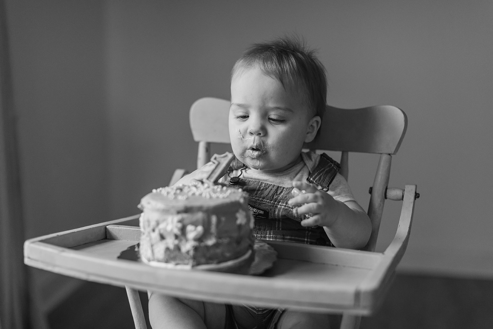 baby boy eating cake