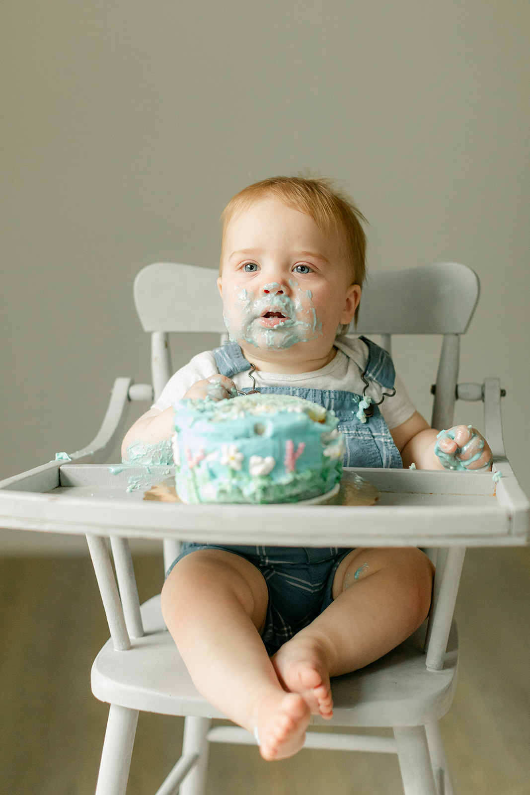 baby boy eating cake