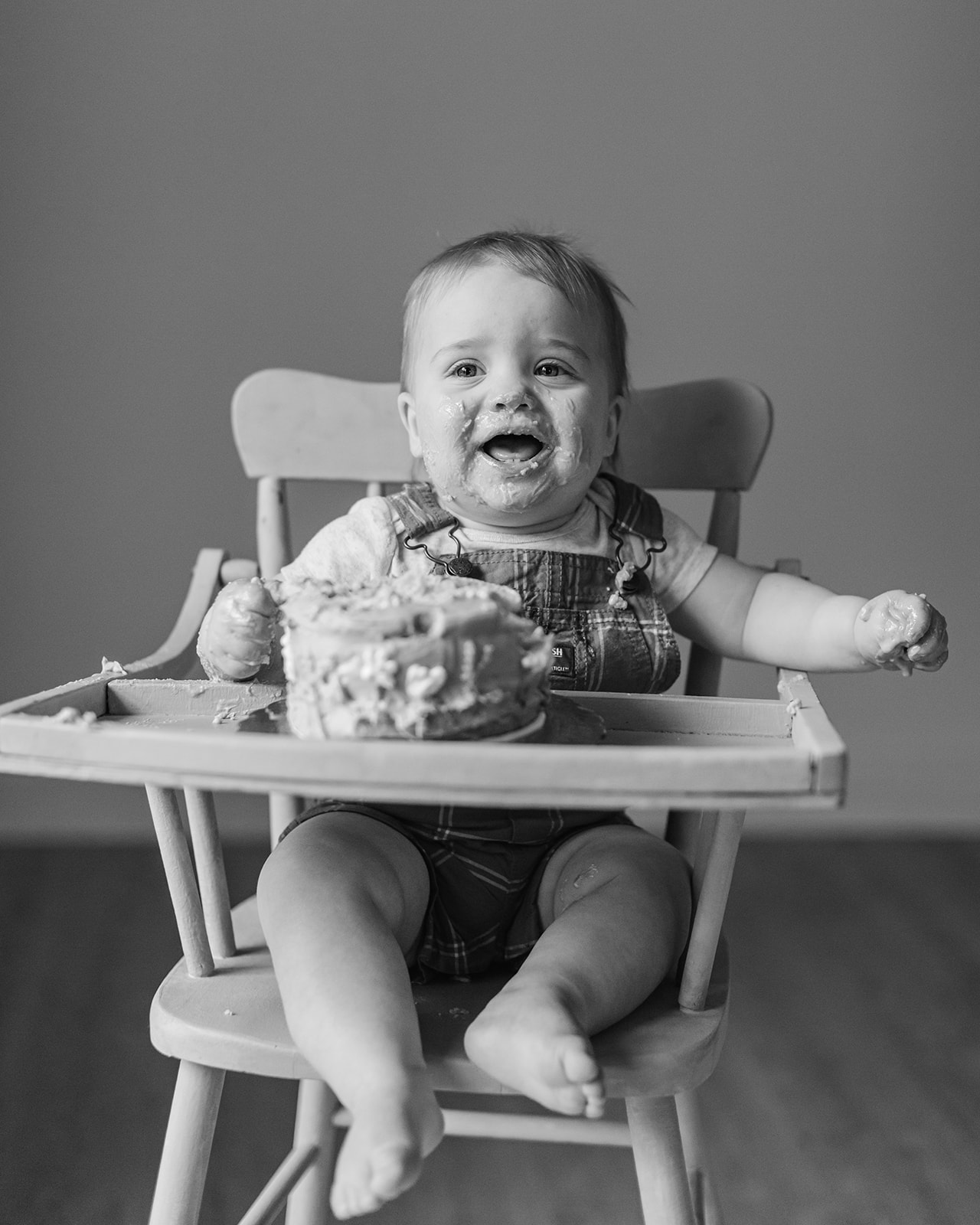 baby boy eating cake