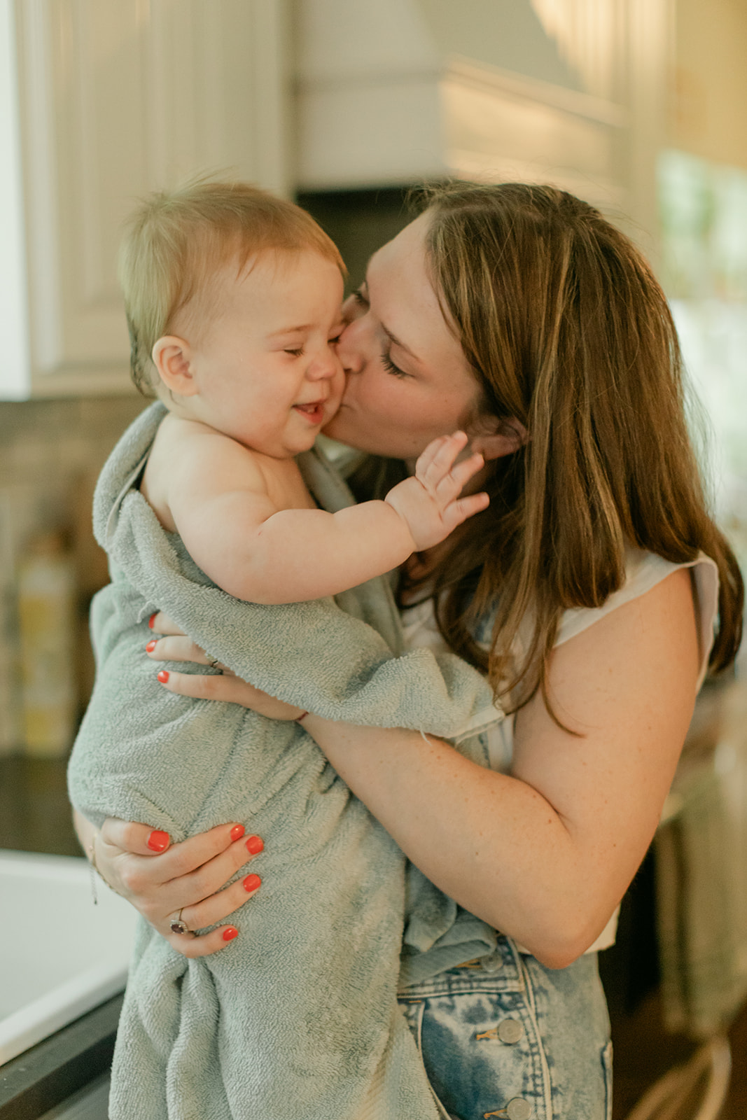 mama and son after kitchen sink bath