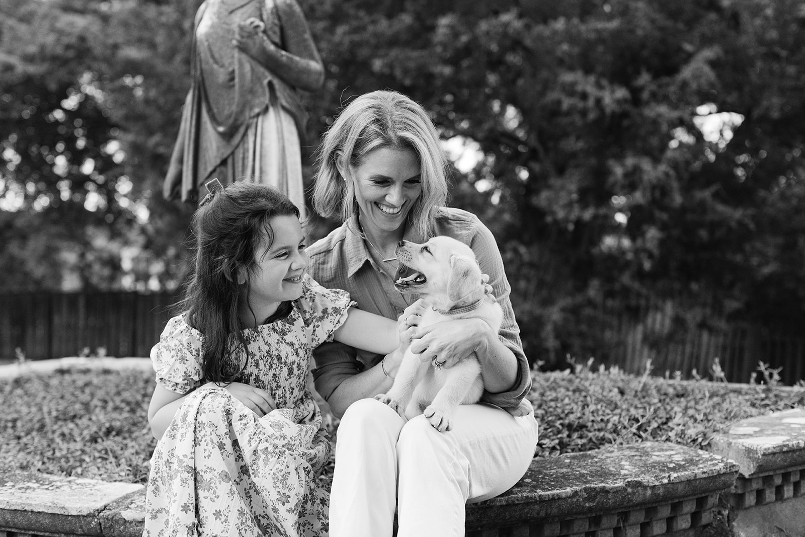 mom and daughter and puppy