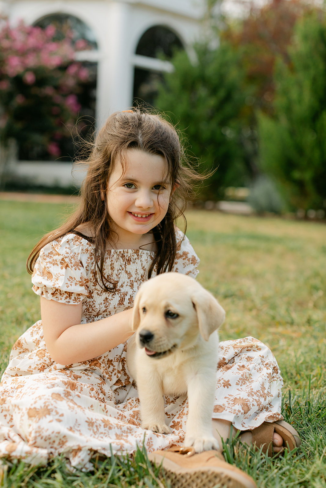 little girl and puppy