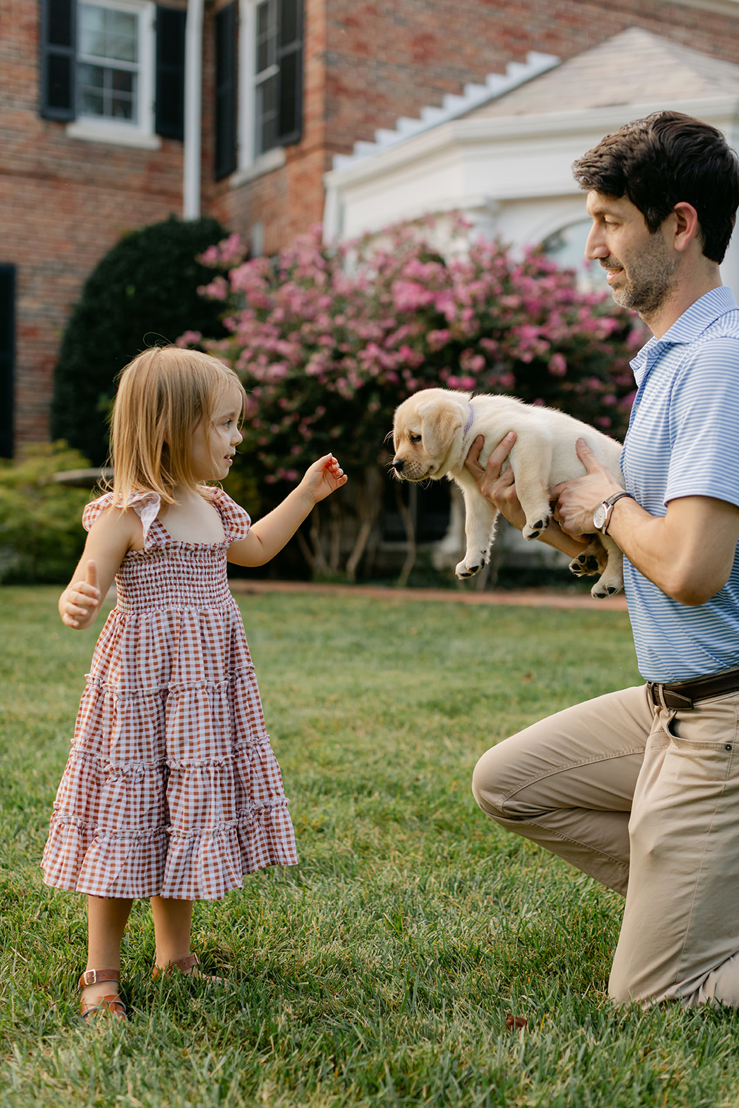 dad daughter and puppy