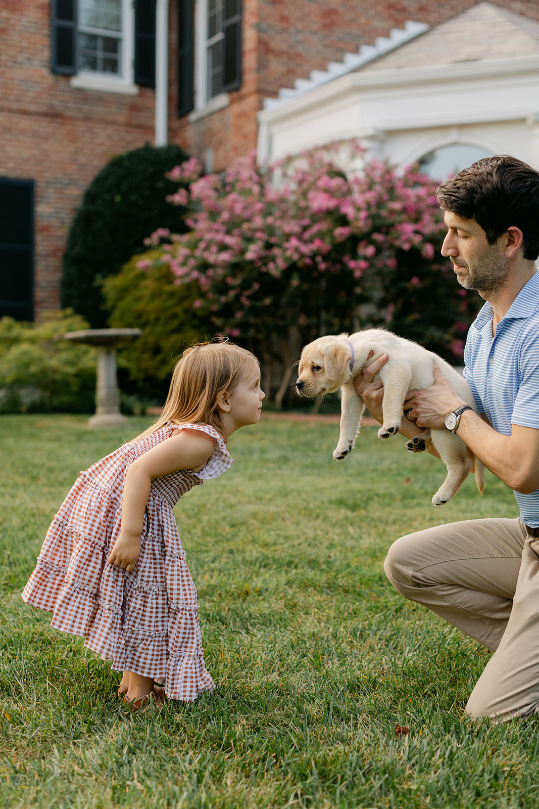 dad daughter and puppy