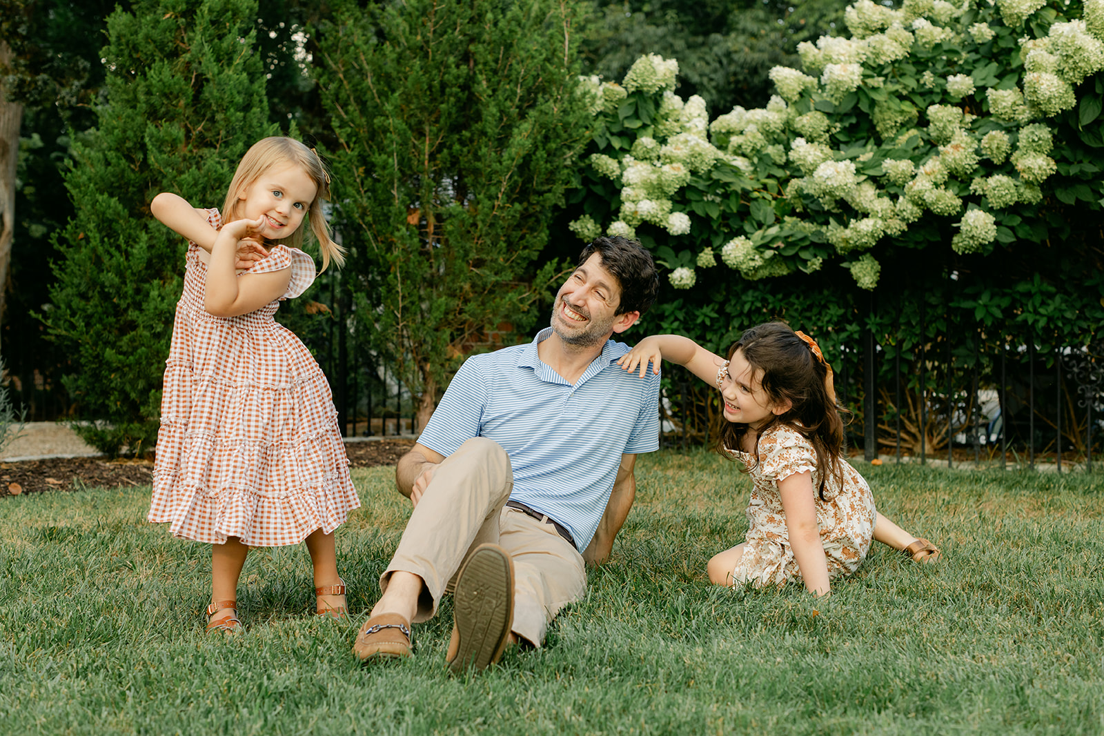 dad and daughters and puppy