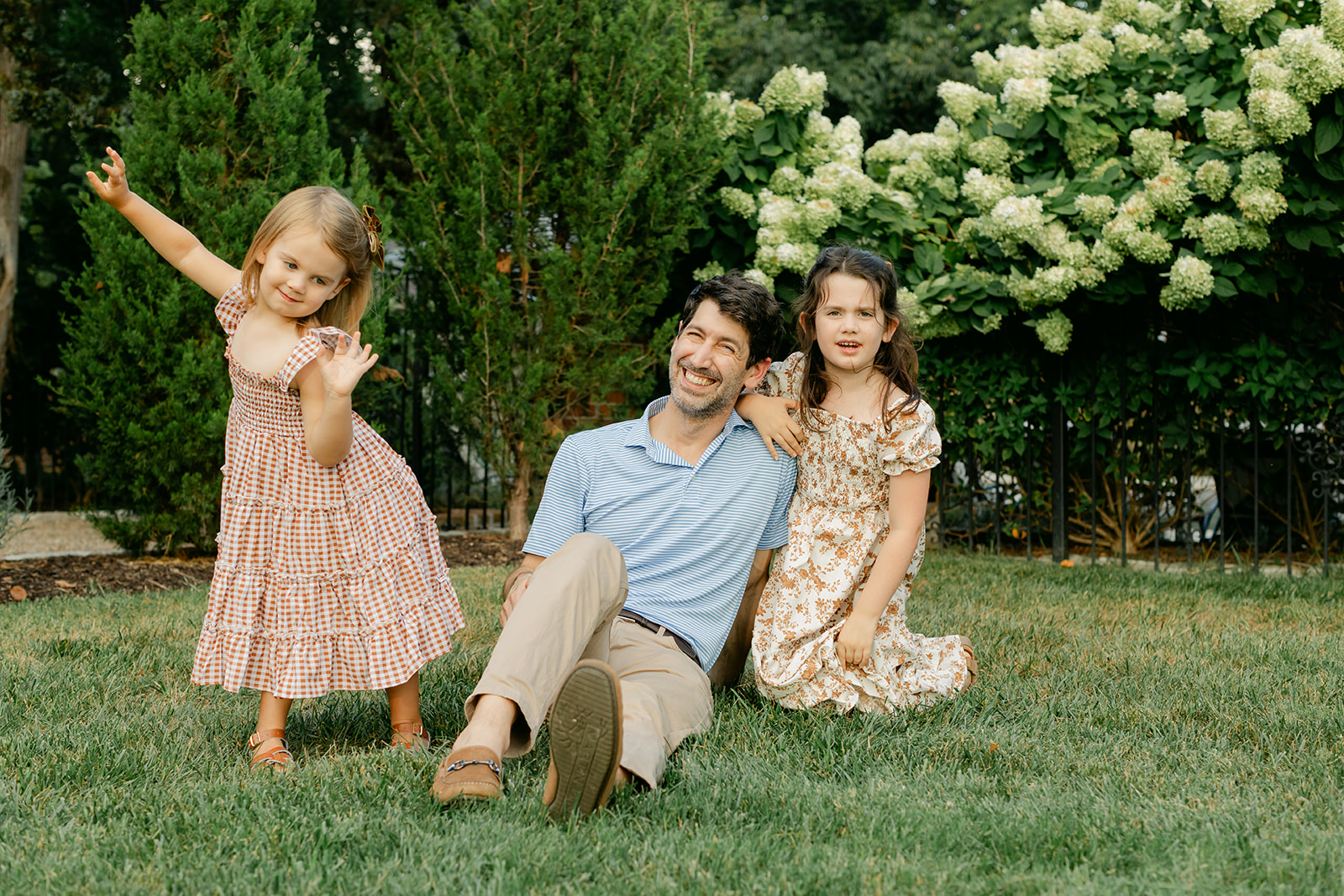 dad and daughters and puppy