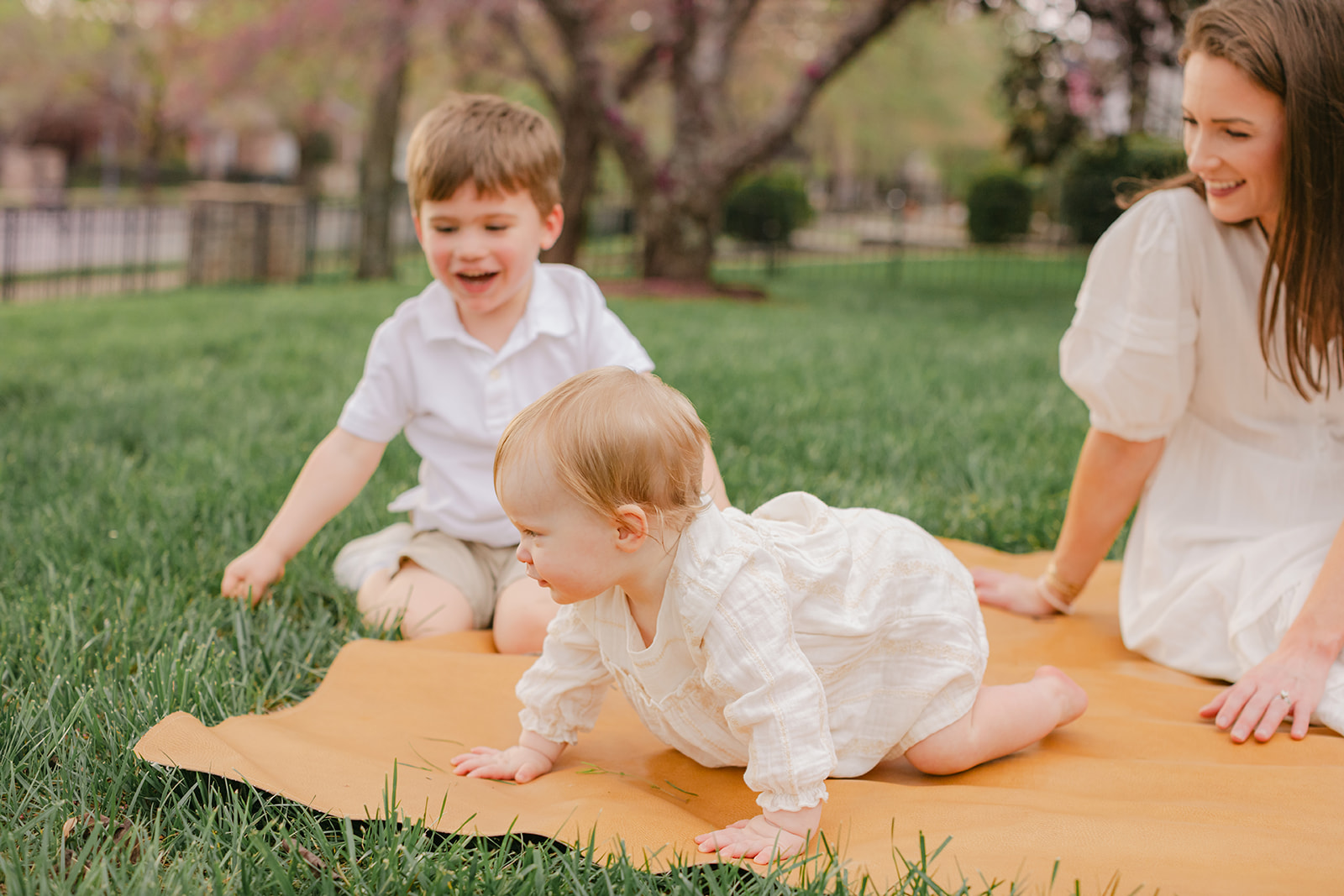 mom with her two kids spring family photos