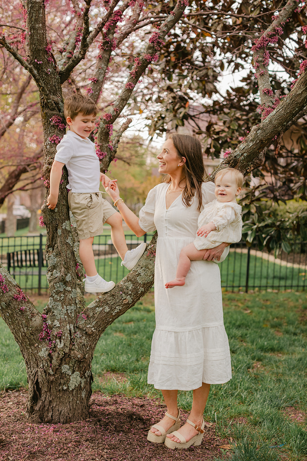 mom with her two kids spring family photos